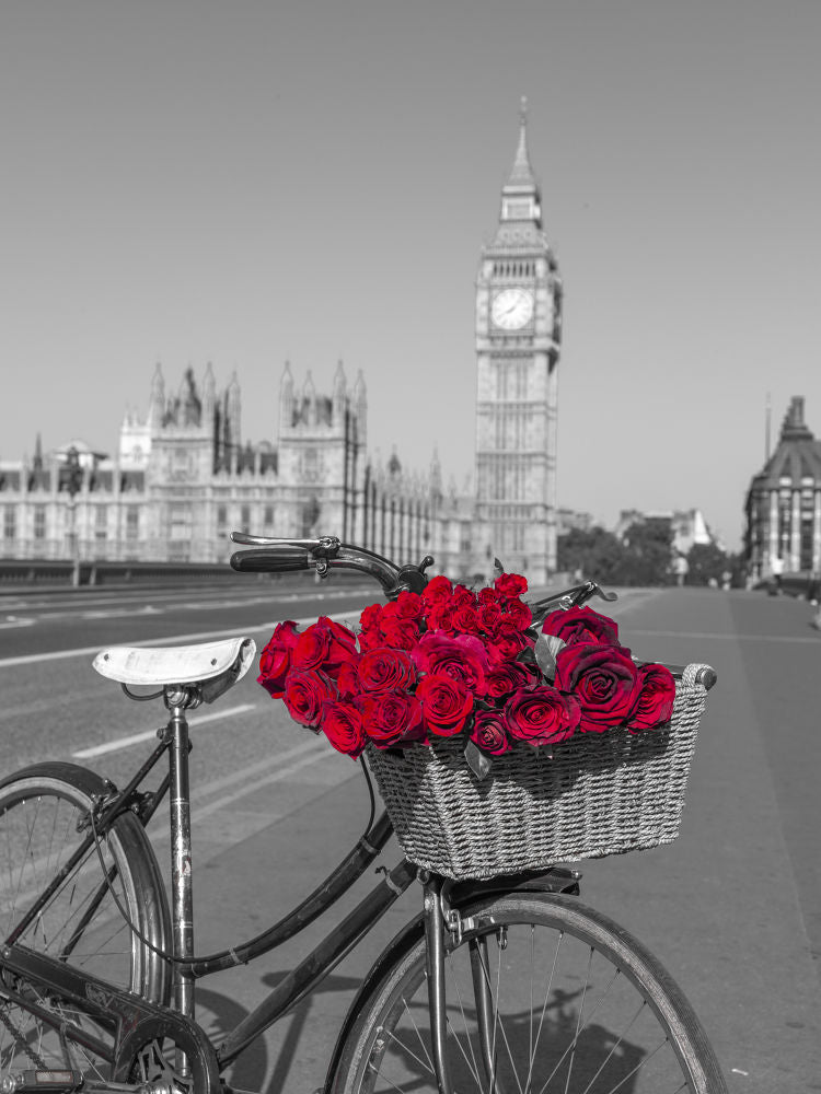 Bicycle with bunch of flowers on Westminster Bridge , London, UK